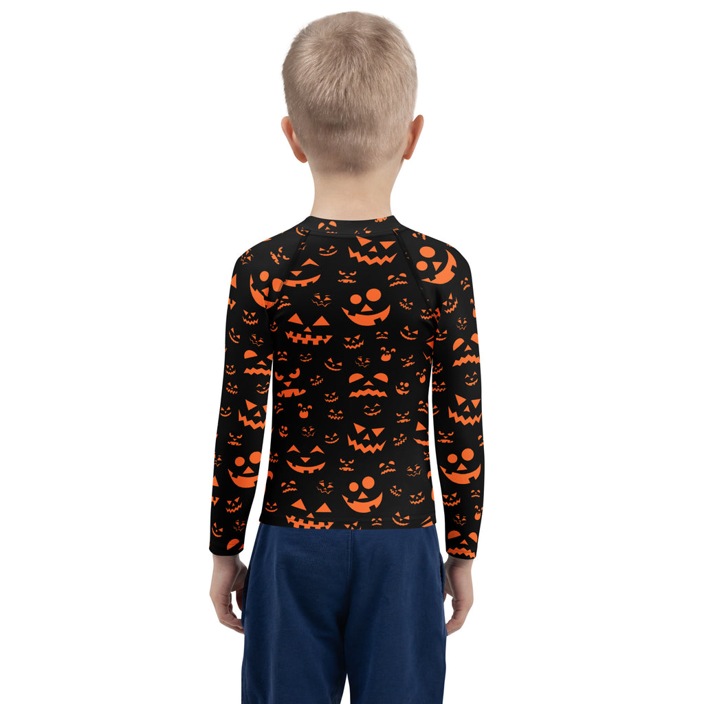 Kids orange jack-o-lantern faces halloween long sleeve rash guard swim shirt with upf 50 plus in black
