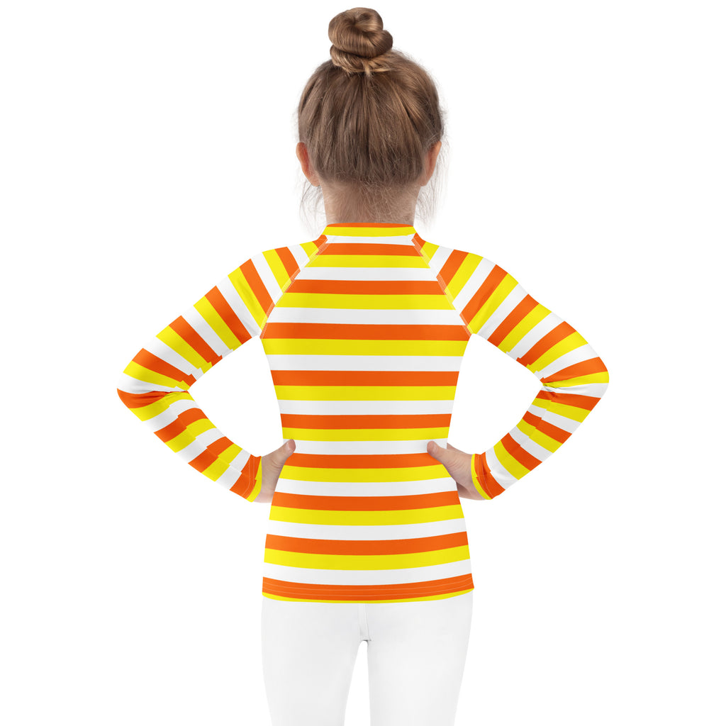 Kids candy corn stripes halloween long sleeve rash guard swim shirt with bold orange yellow white stripes and upf 50+ protection