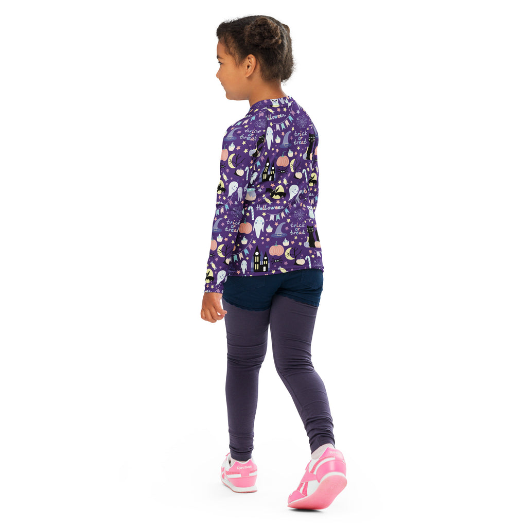 Purple kids spooky halloween long sleeve rash guard swim shirt with ghost pumpkin haunted house prints and UPF 50+ protection