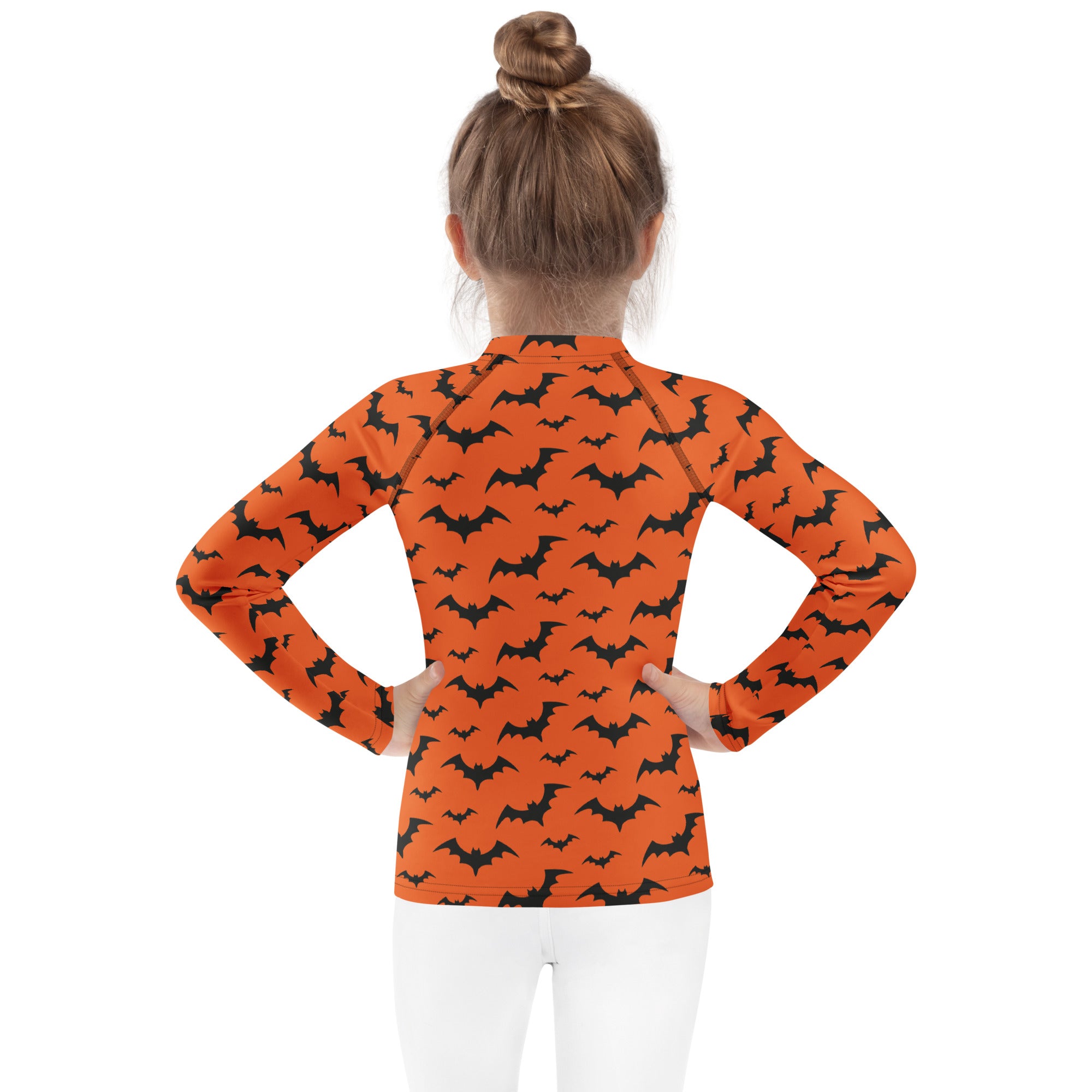 Kids orange long sleeve rash guard swim shirt with black bat pattern and UPF 50 plus sun protection for Halloween
