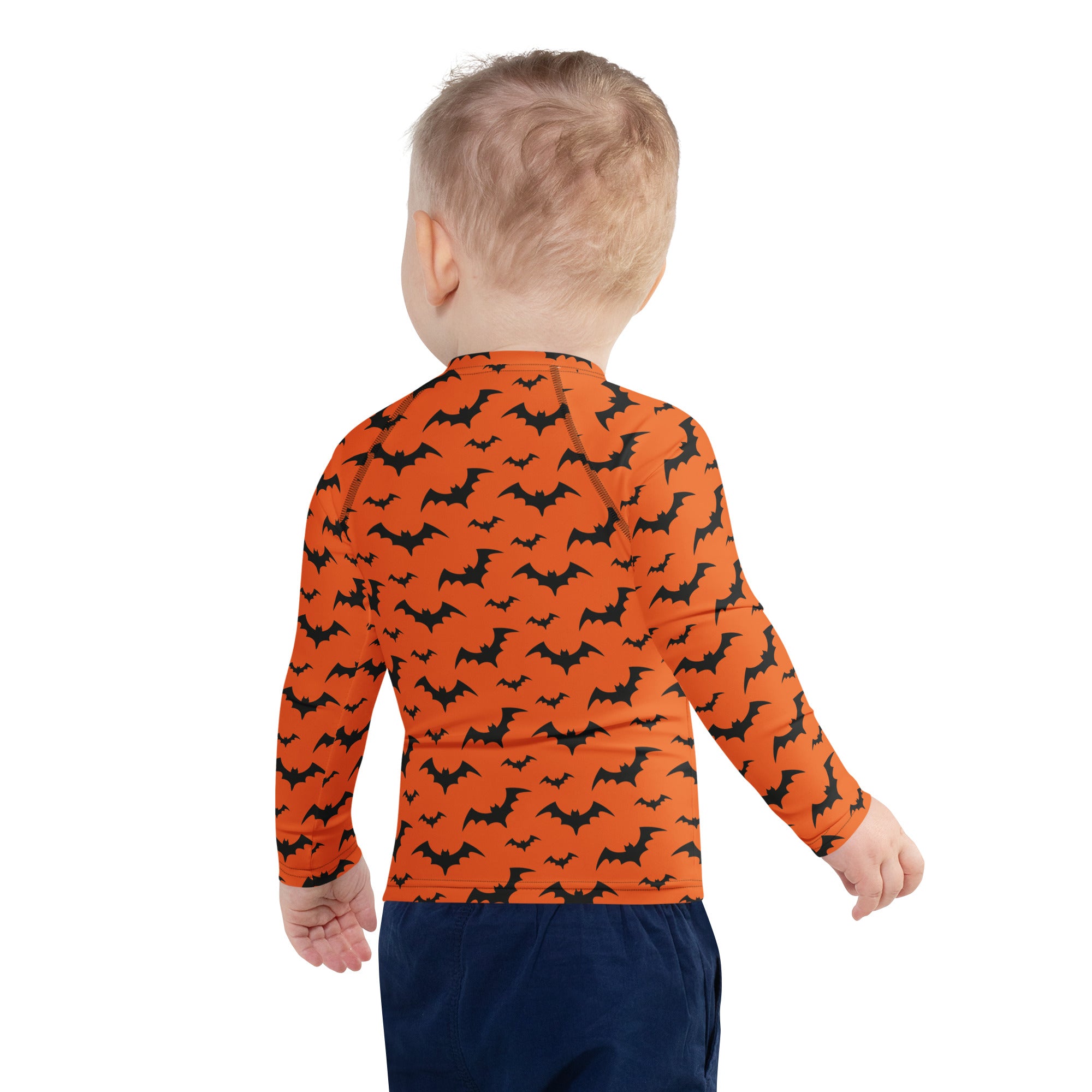 Kids orange long sleeve rash guard swim shirt with black bat pattern and UPF 50 plus for Halloween sun protection