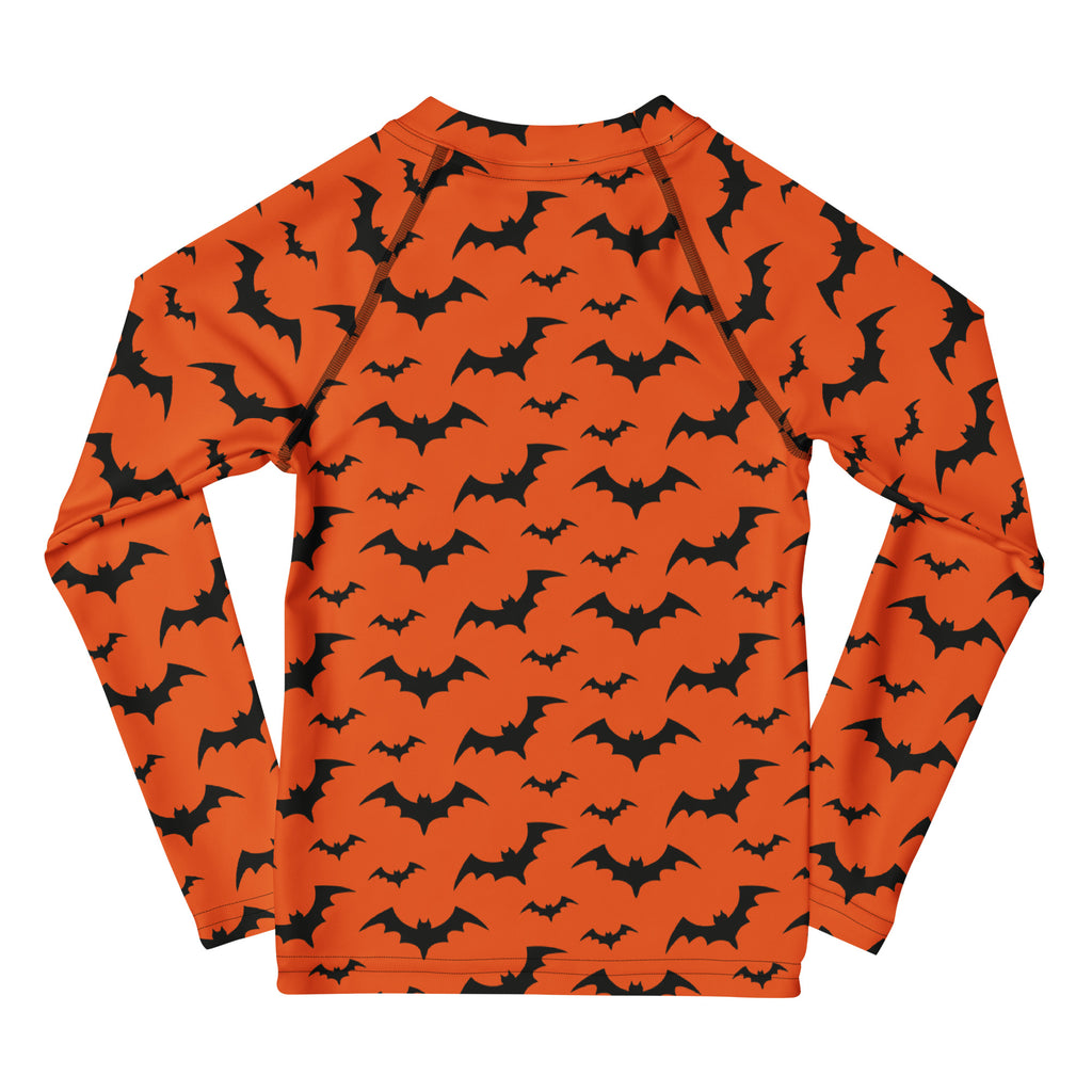 Kids orange long sleeve rash guard swim shirt with black bat patterns and upf 50 plus for halloween