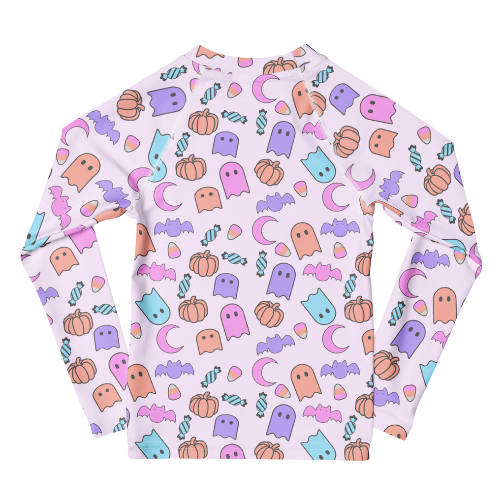 Girls halloween pattern long sleeve rash guard swim shirt light pink with pastel ghosts pumpkins bats candy upf 50+