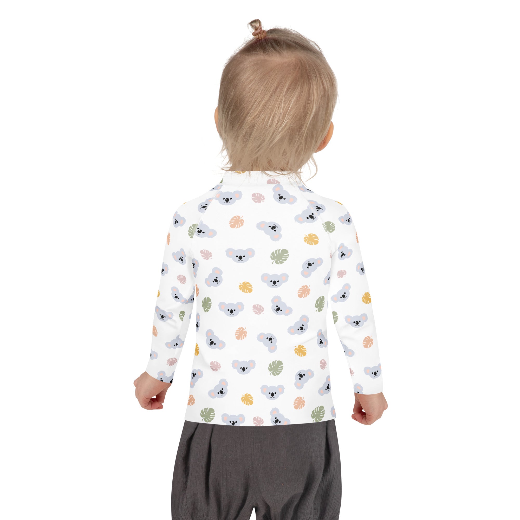 White long-sleeved kids rash guard swim shirt with gray koalas and multicolored tropical leaves features UPF 50+ protection