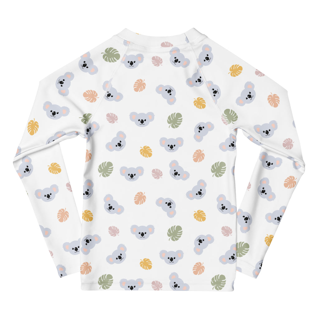 White long sleeve rash guard for kids with playful gray koalas and tropical leaves pattern and upf 50 plus protection