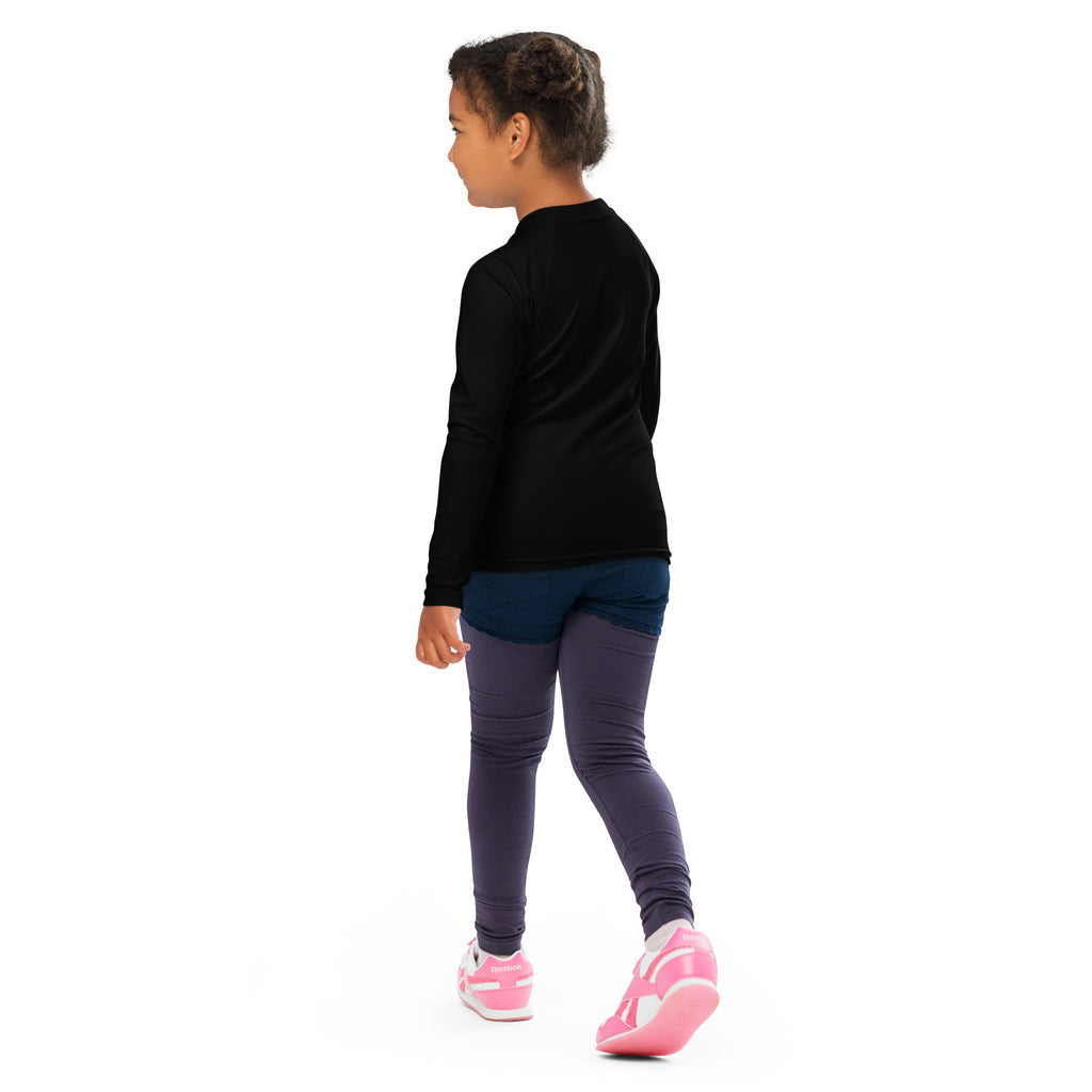 A child wearing a black kids colorful horse outline long sleeve rash guard swim shirt with upf 50 plus