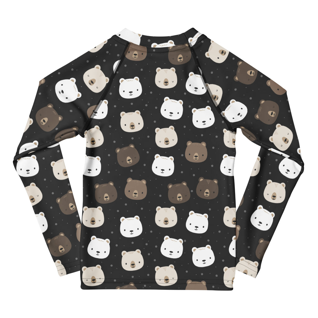 Black long sleeve kids rash guard with playful white and brown cartoon bear faces and UPF 50 plus sun protection