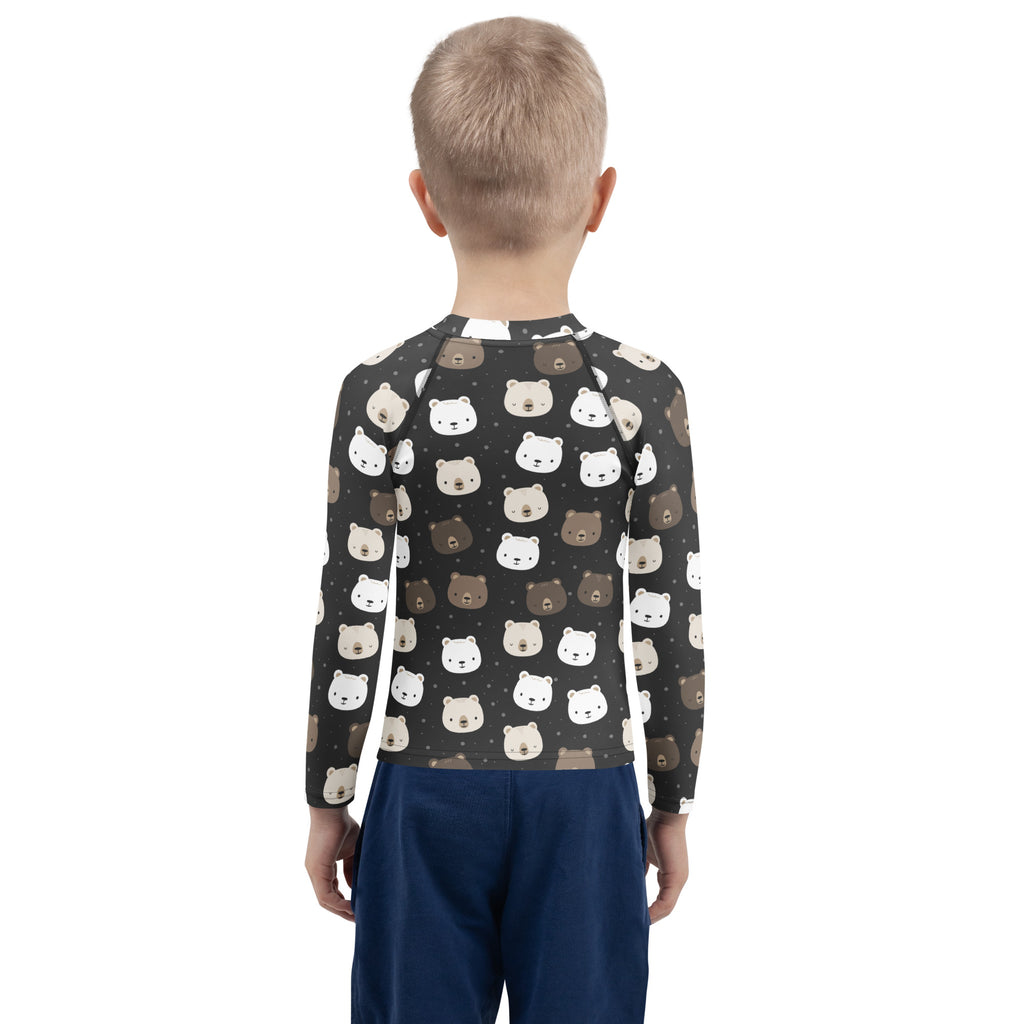 Black long sleeve rash guard with playful white and brown bear faces pattern kids UPF 50 plus swim shirt
