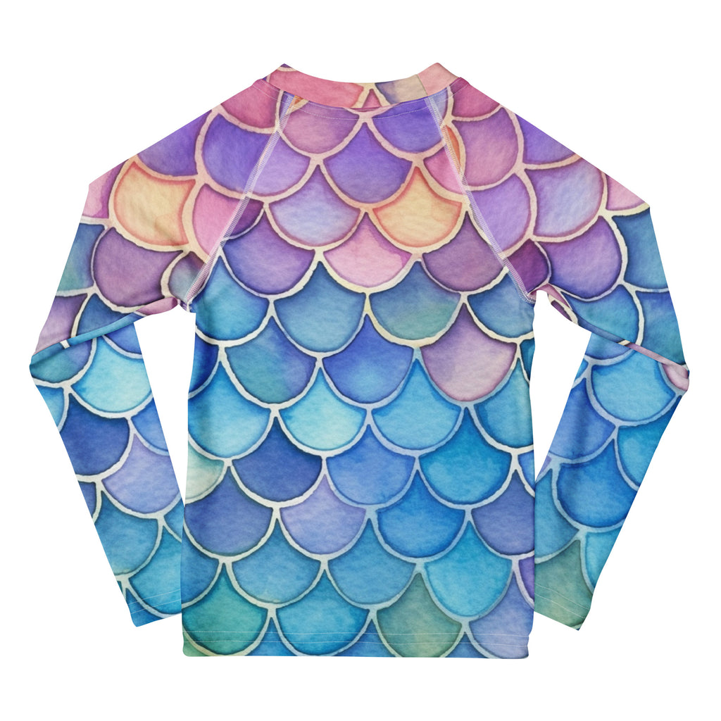 Girls long-sleeve rash guard with watercolor rainbow mermaid scale pattern in purple blue and pink with upf 50 plus