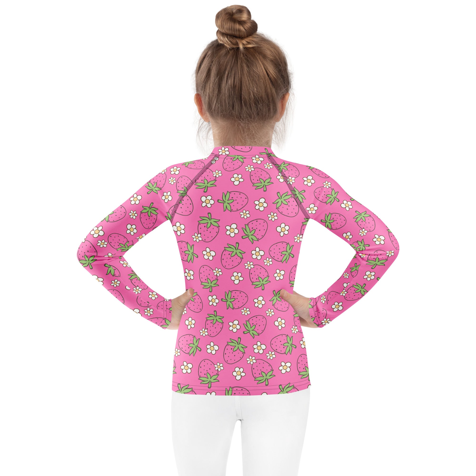 Girls pink long sleeve rash guard swim shirt with playful strawberry pattern and UPF 50 plus sun protection