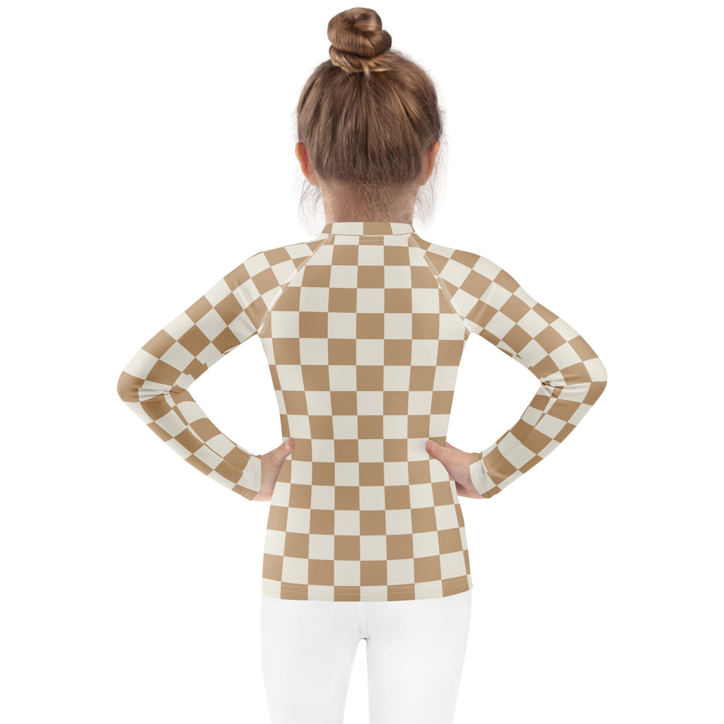 Kids sand checkerboard long sleeve rash guard swim shirt with upf 50 plus featuring beige and cream checkerboard pattern