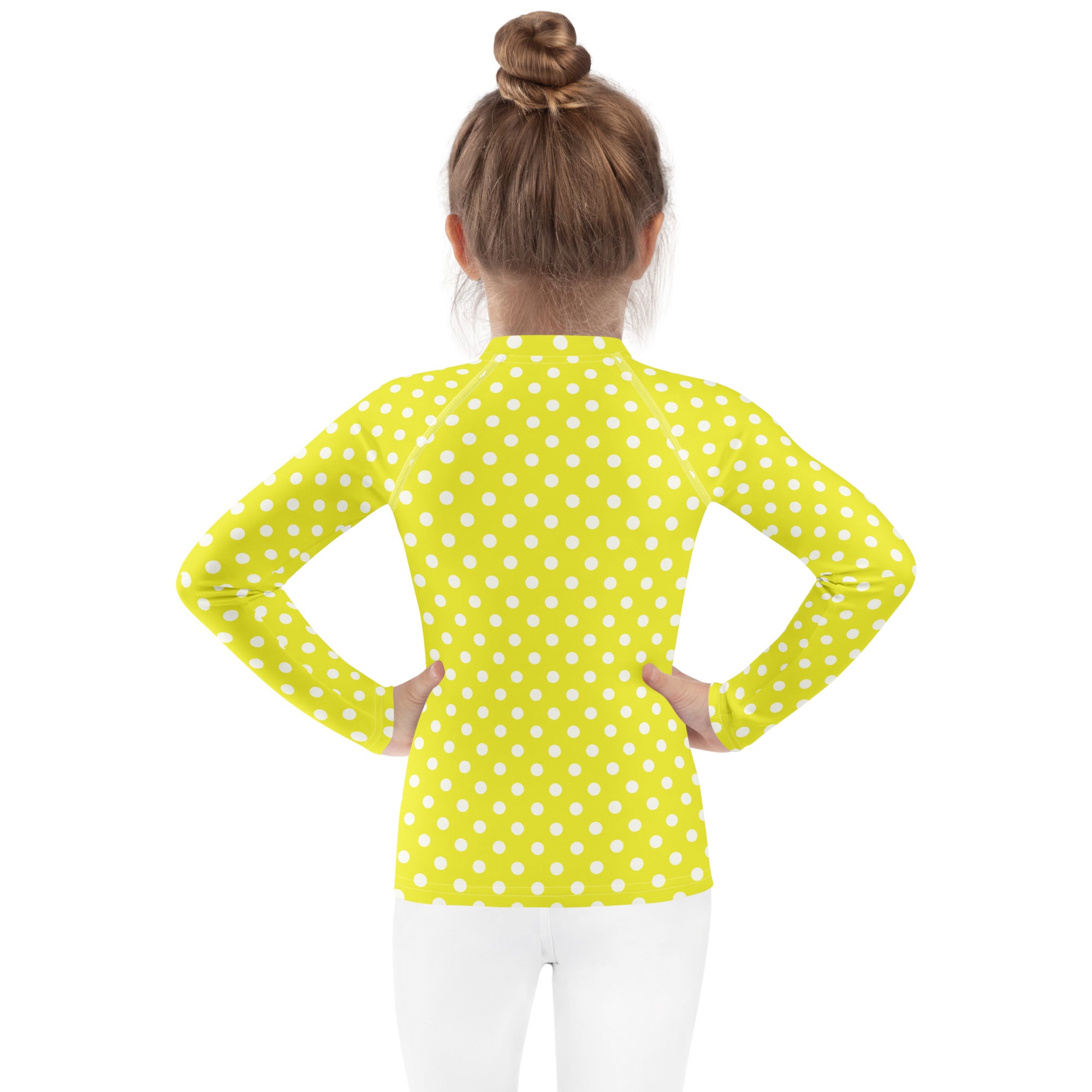 Kids yellow long sleeve rash guard swim shirt with white polka dots and UPF 50 plus for sun protection
