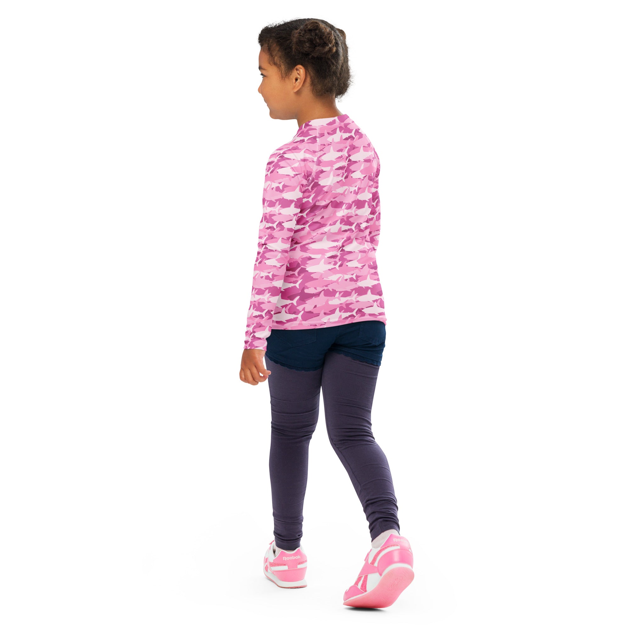Girls pink long sleeve rash guard swim shirt with white shark pattern and upf 50 plus for sun protection