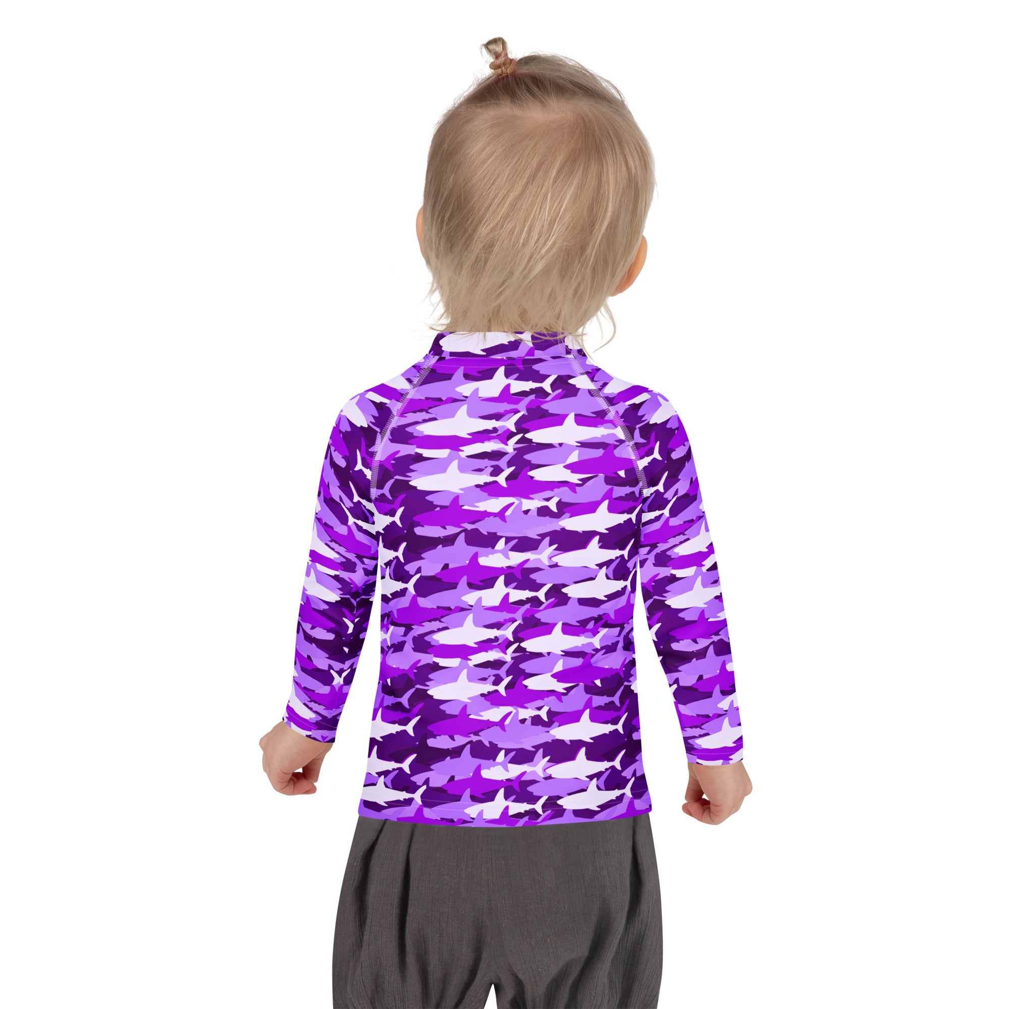 Girls purple and white shark-patterned long sleeve rash guard swim shirt with upf 50 plus for sun protection