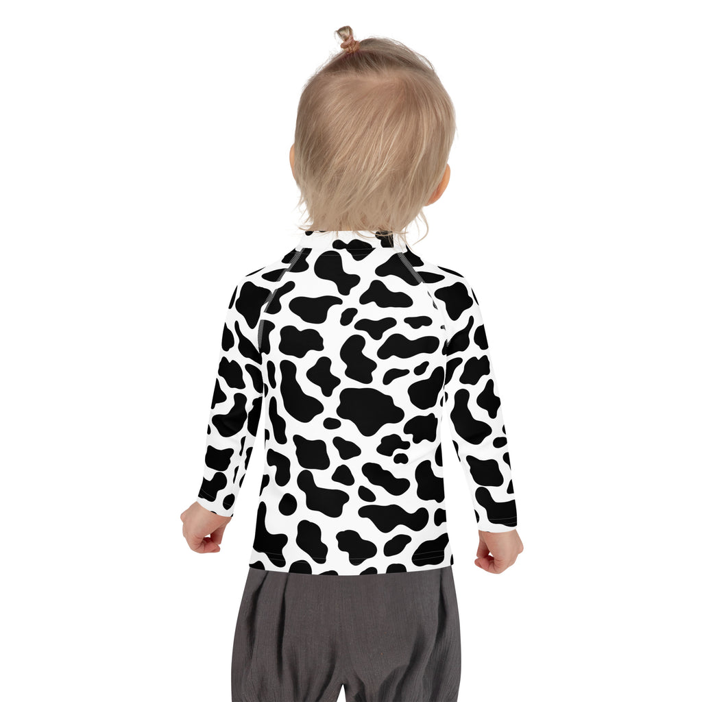 Kids cow print long sleeve rash guard swim shirt with UPF 50 plus in black and white for sun protection