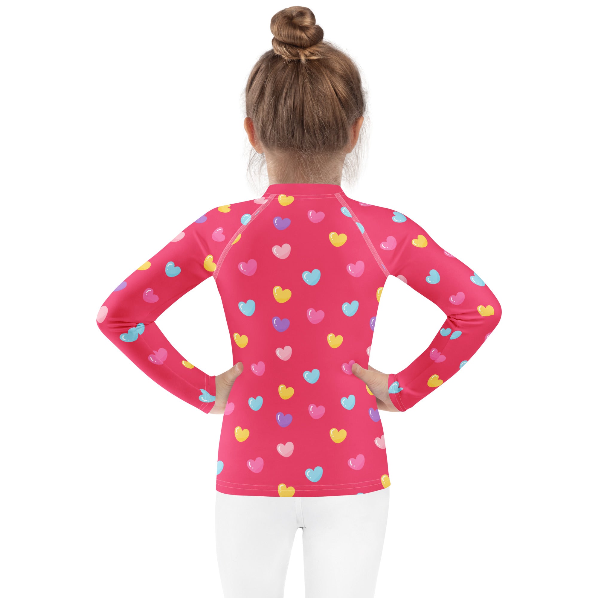Girls colorful hearts pink long sleeve rash guard swim shirt with UPF 50 plus featuring multicolored heart pattern