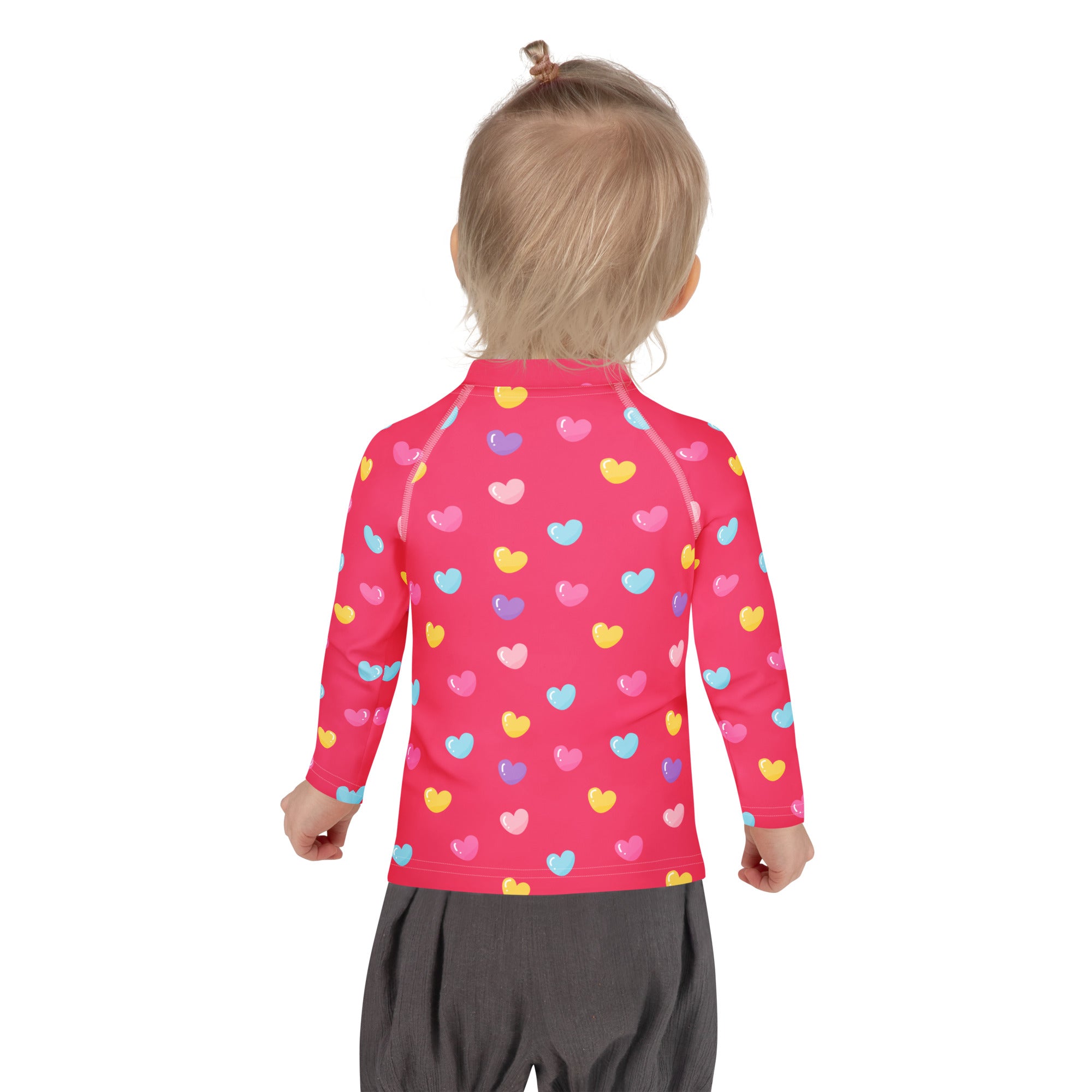 Girls colorful hearts pink long sleeve rash guard swim shirt with UPF 50 plus featuring multicolored heart pattern