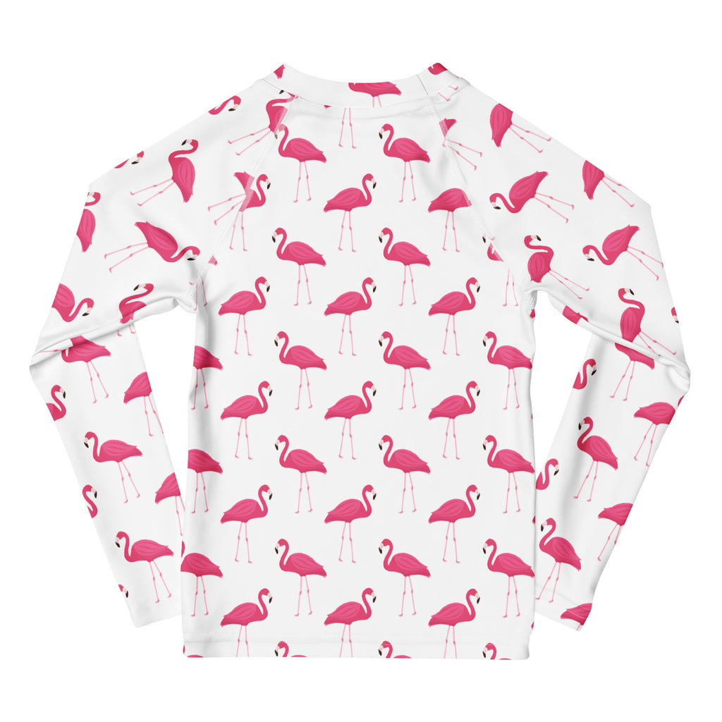 Kids pink flamingo long sleeve rash guard swim shirt with UPF 50 plus in white with vibrant pink flamingo pattern