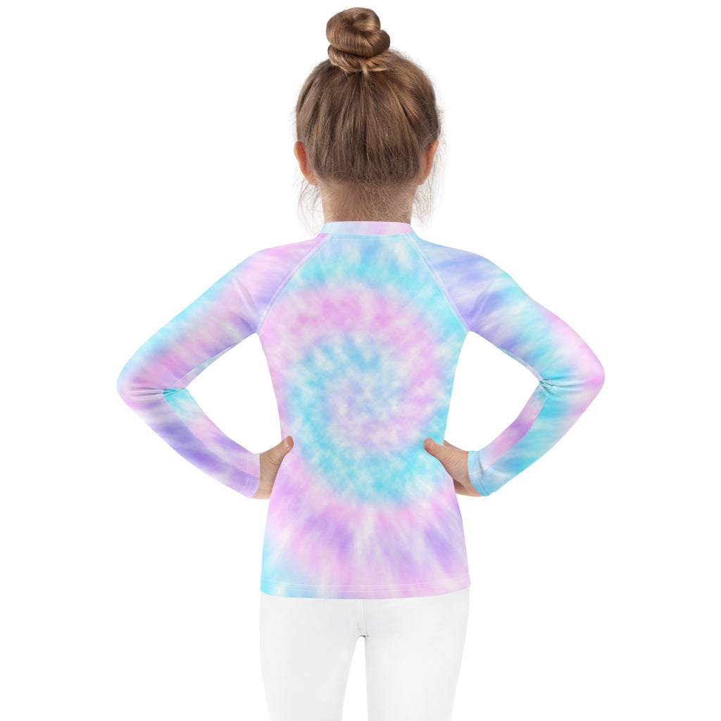 A vibrant pastel tie dye long sleeve rash guard swim shirt for girls with pink blue purple swirls and upf 50 plus protection