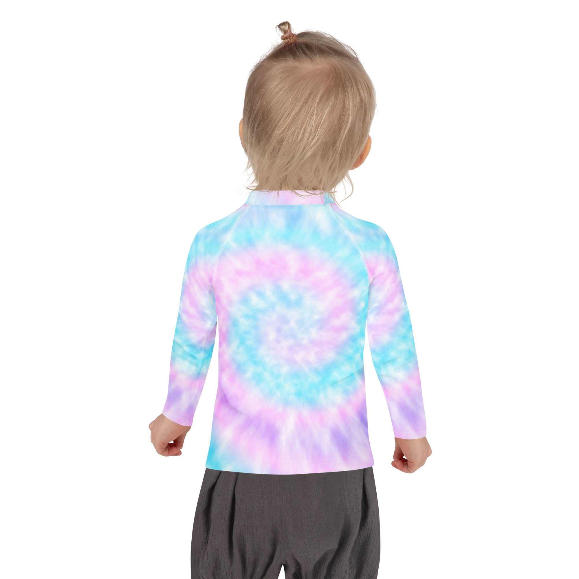 A child wearing a girl tie dye long sleeve rash guard swim shirt with upf 50 plus in blue pink and purple pastel shades