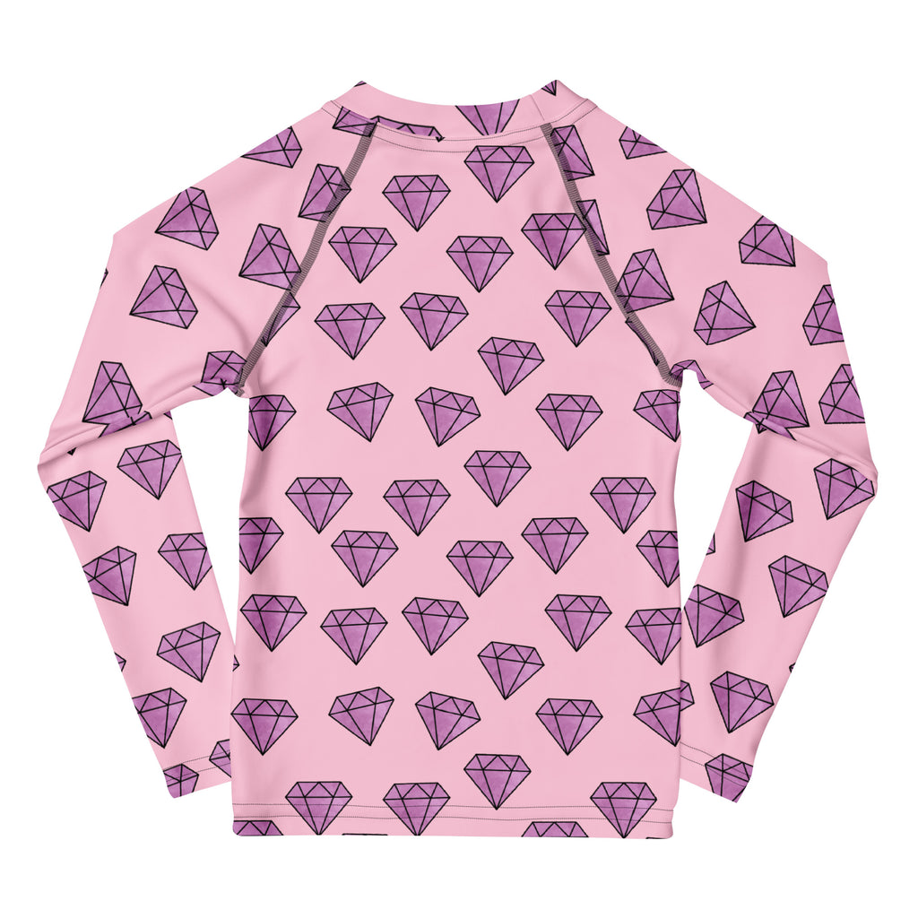 Pink long-sleeved rash guard swim shirt with purple diamond pattern and UPF 50 plus sun protection for girls