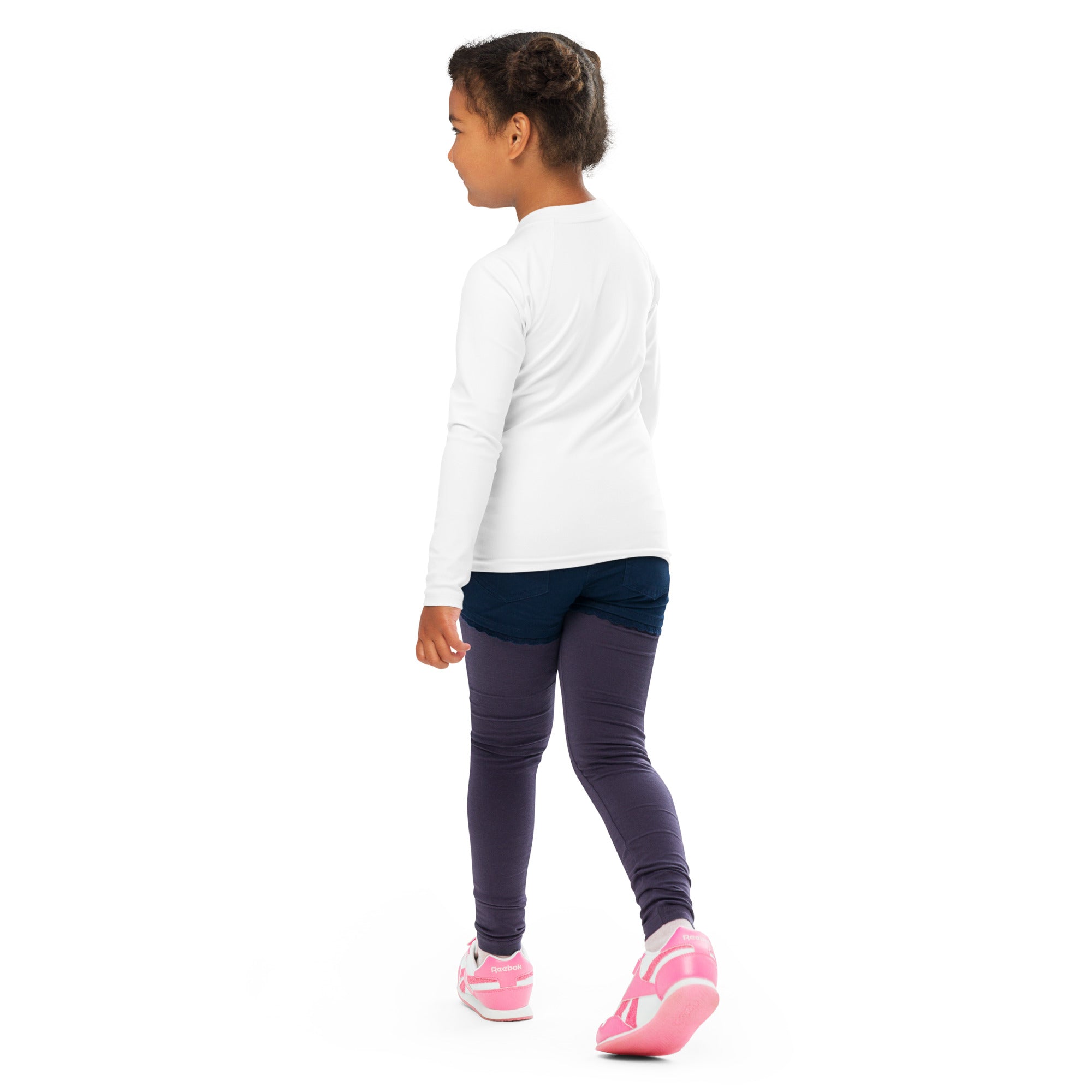 A child wearing a girls unicorn long sleeve rash guard swim shirt with upf 50 plus white and navy leggings