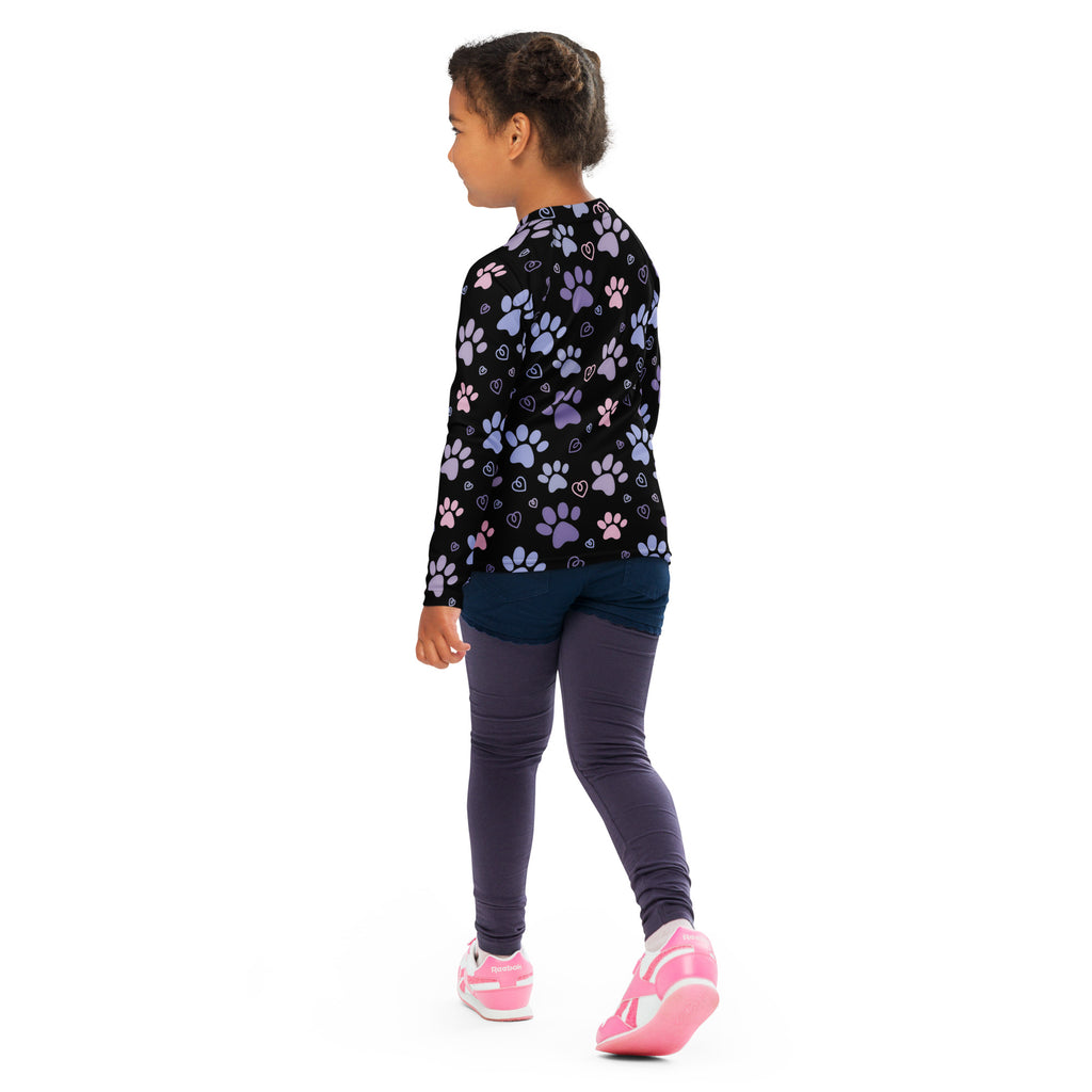 Girls purple and pink paw print long sleeve rash guard swim shirt with UPF 50 plus in black with playful pattern