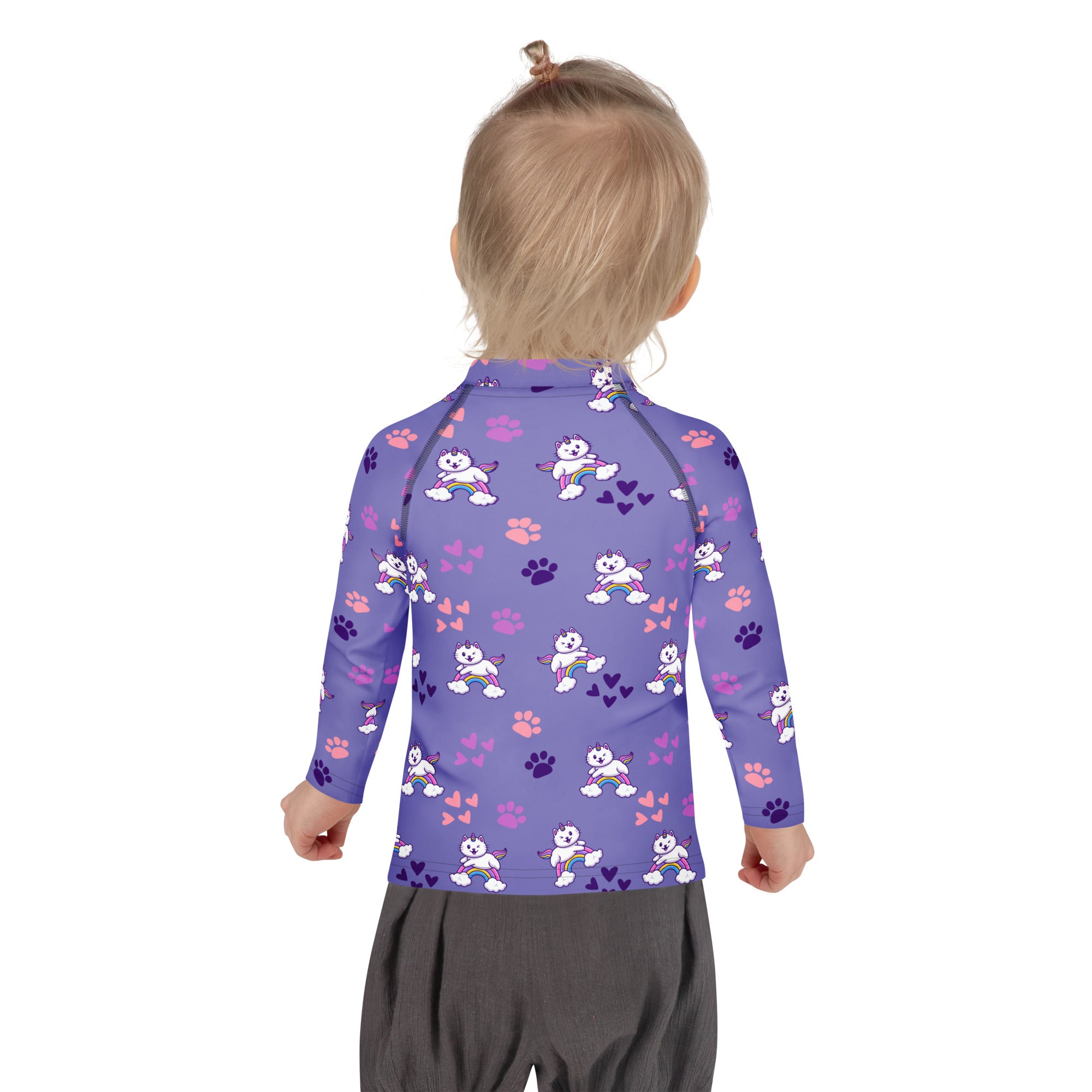 Girls purple caticorn long sleeve rash guard with white cartoon cats rainbows pink paw prints and upf 50 plus protection