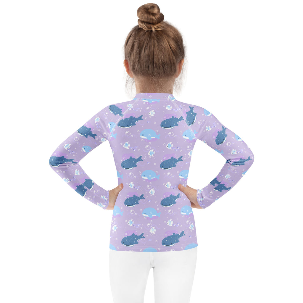 Girls purple whale shark long sleeve rash guard swim shirt with upf 50 lavender fabric and blue whale fish pattern