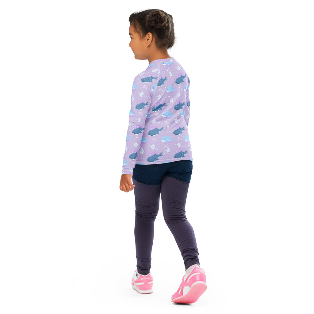 Girls purple whale shark long sleeve rash guard swim shirt with UPF 50 plus featuring blue whales and white seashells pattern