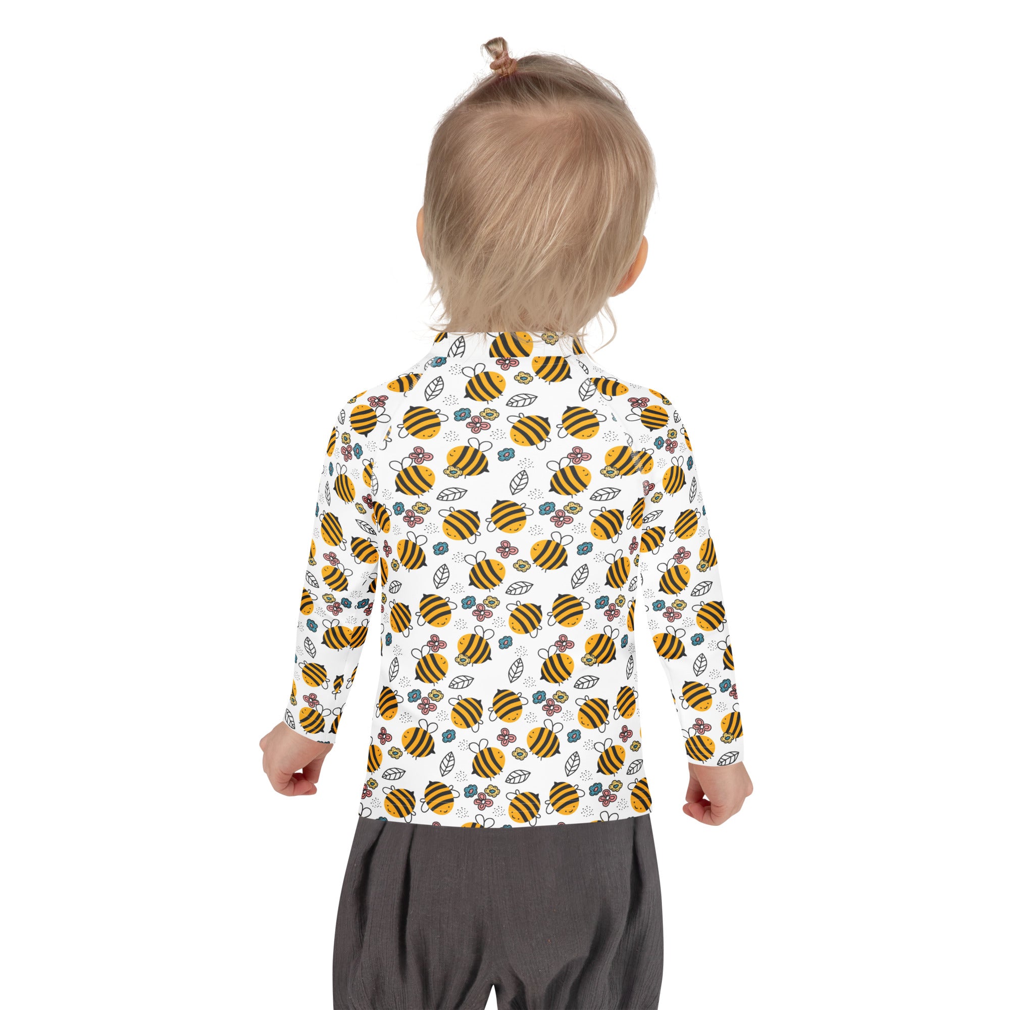 Kids floral yellow bumblebee long sleeve rash guard swim shirt with upf 50 plus featuring a bee and leaf pattern