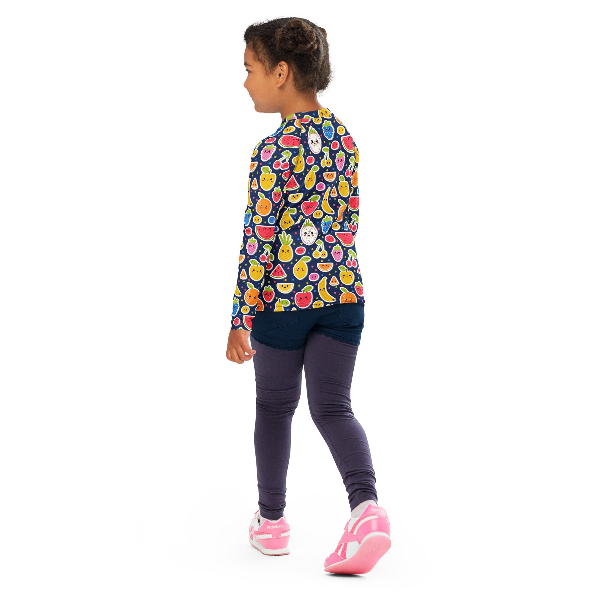 A child wearing a navy blue kids emoji fruit long sleeve rash guard swim shirt with UPF 50 plus protection