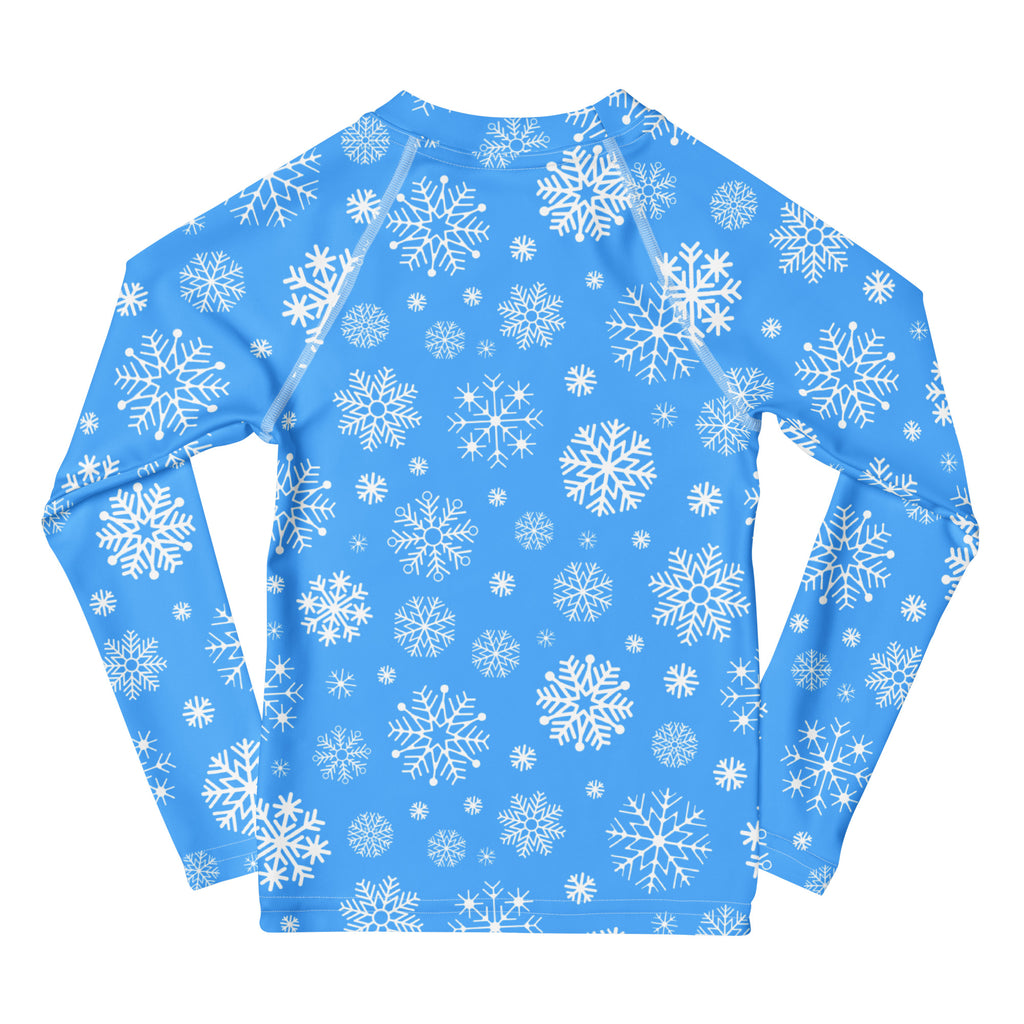 Kids blue long sleeve rash guard swim shirt with white snowflake pattern and upf 50 plus sun protection