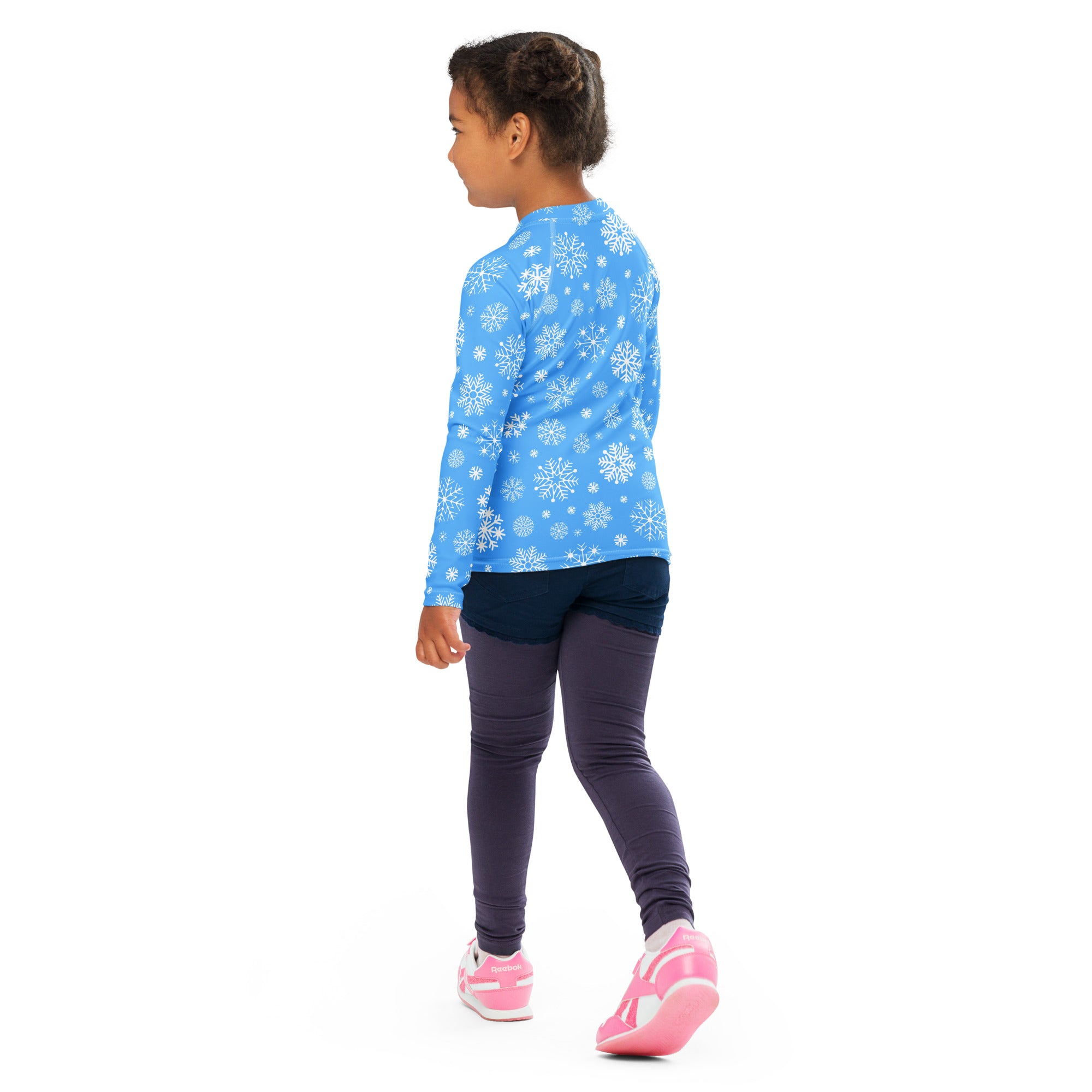 Kids blue long sleeve rash guard swim shirt with white snowflake pattern and upf 50 plus sun protection