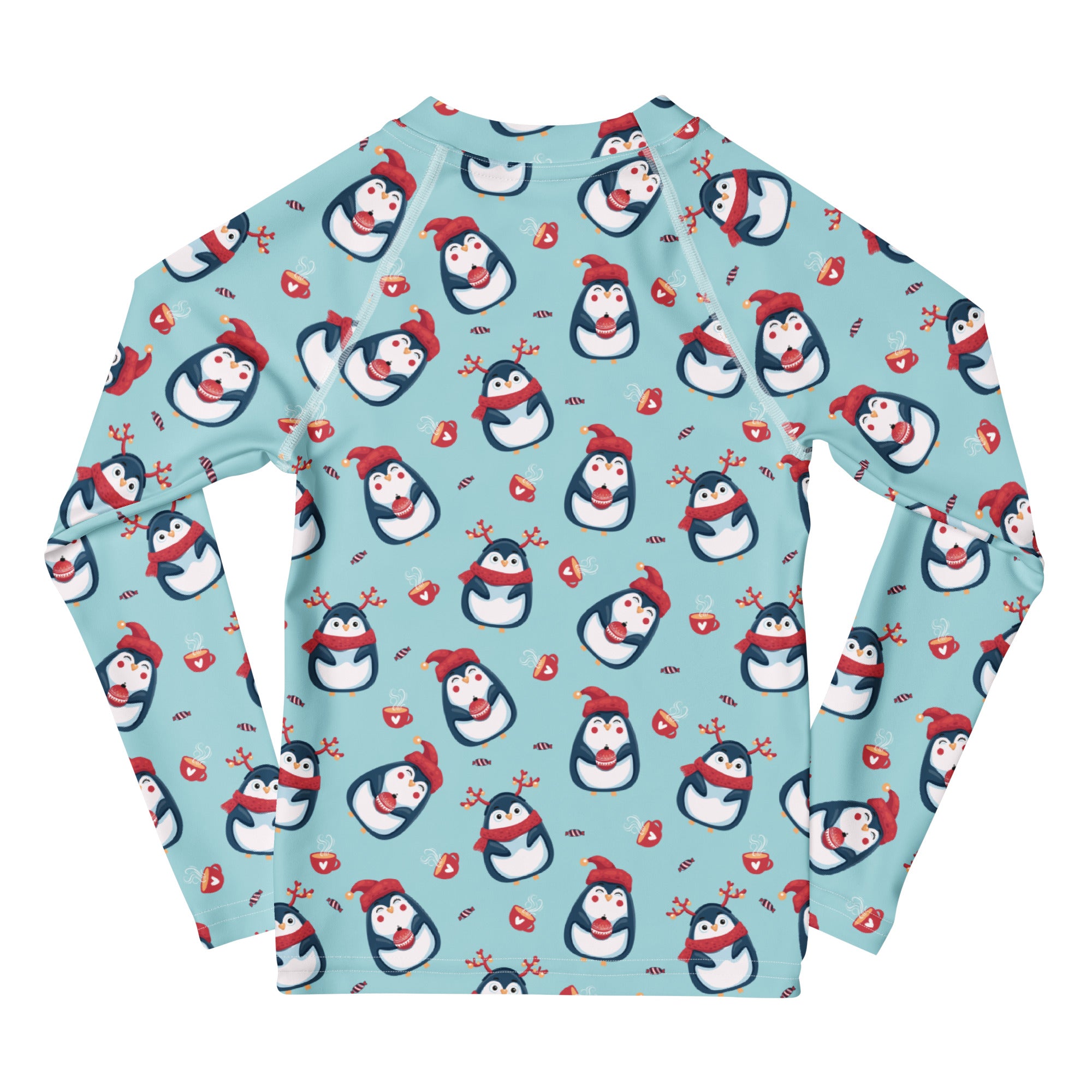 A light blue kids long sleeve rash guard swim shirt with UPF 50+ featuring cartoon penguins red hats scarves and reindeer antlers