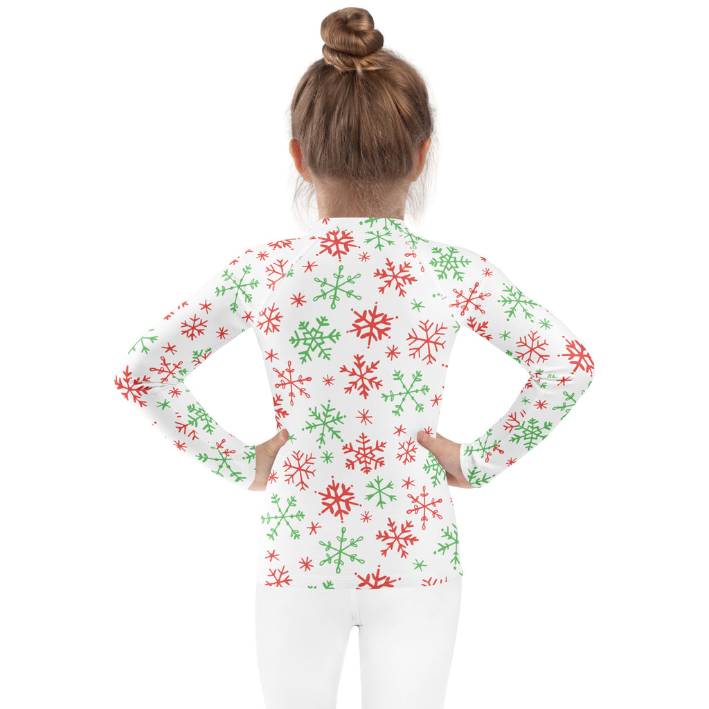Kids red and green snowflakes long sleeve rash guard swim shirt with UPF 50+ featuring festive snowflake pattern