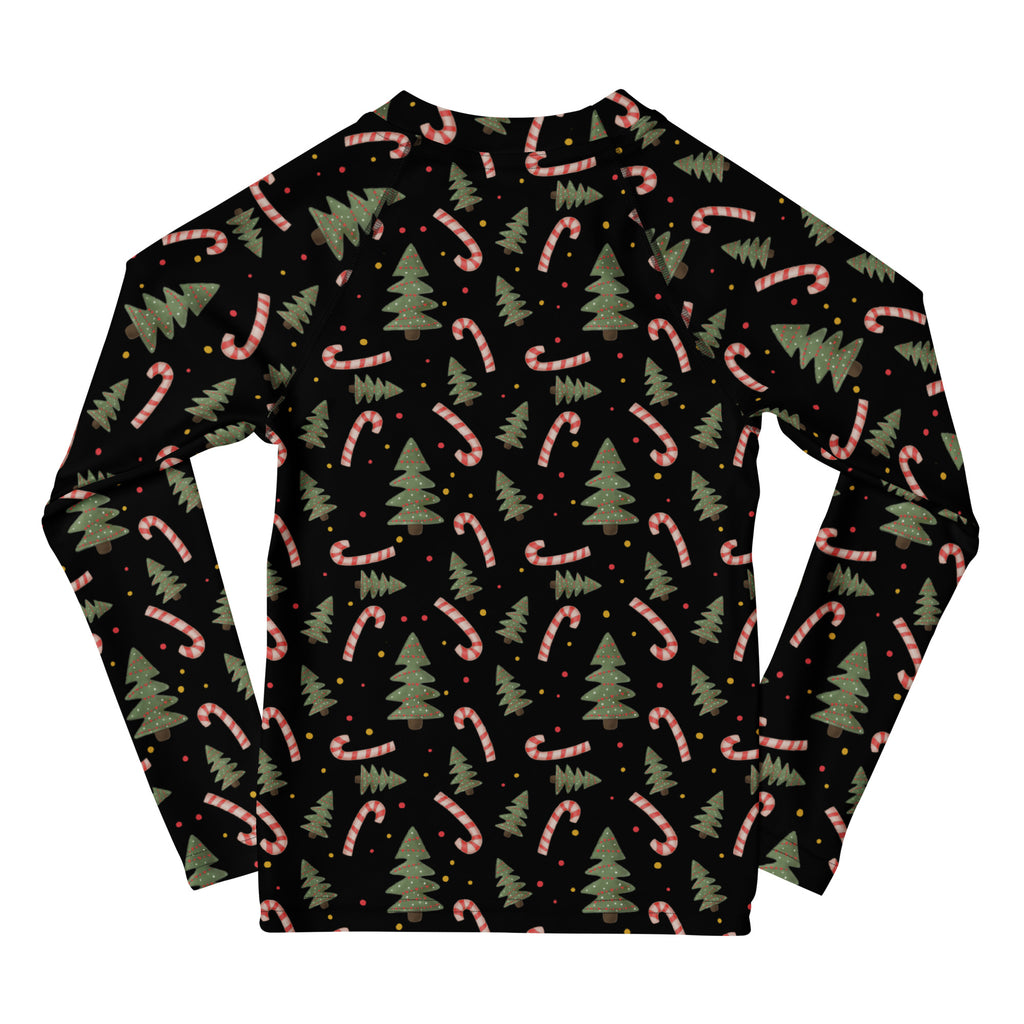 Black kids long sleeve rash guard swim shirt with pink and green candy cane and pine tree festive pattern upf 50+