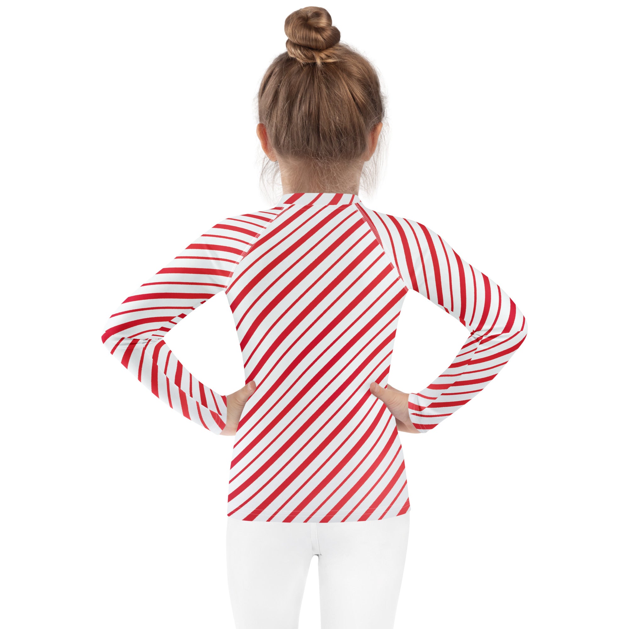 Kids red and white candy cane striped long sleeve rash guard swim shirt with upf 50 plus for sun protection