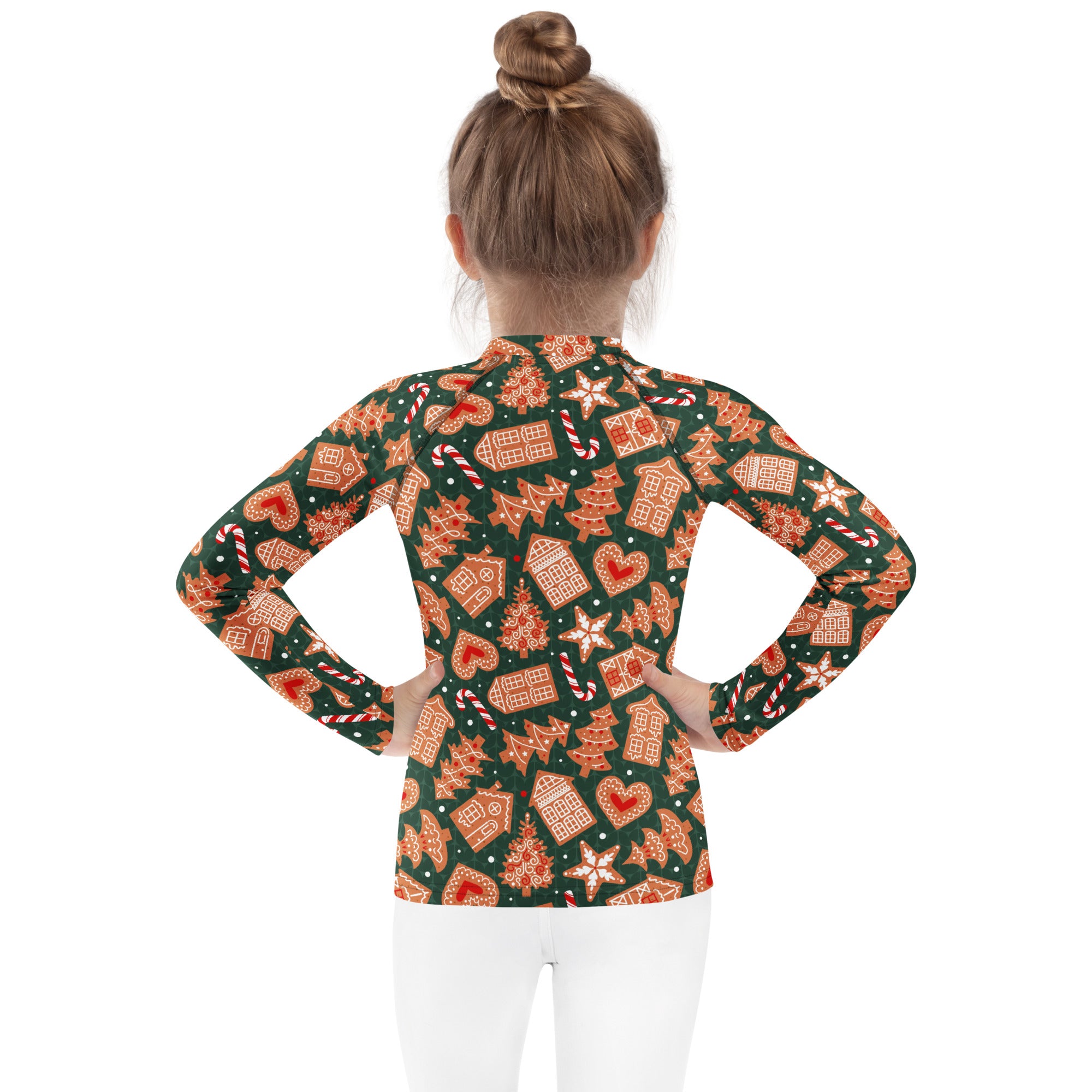 Kids green gingerbread christmas long sleeve rash guard swim shirt with upf 50 plus featuring festive print