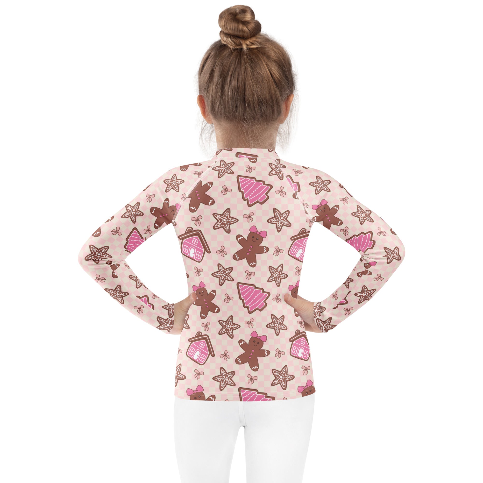 Kids pink long sleeve rash guard swim shirt with upf 50 and festive gingerbread men christmas pattern