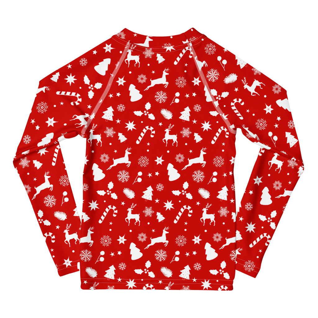 Kids red long sleeve rash guard swim shirt with festive white Christmas pattern and UPF 50 plus sun protection