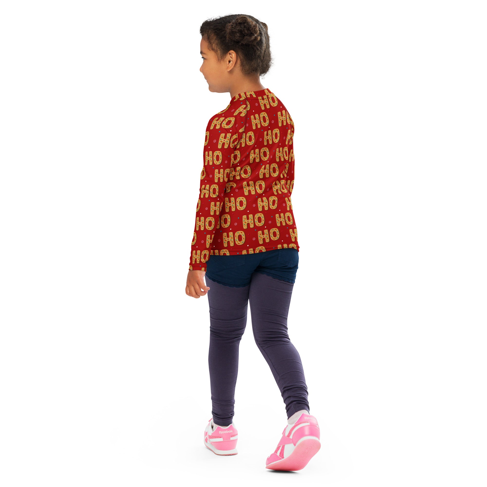 Kids Ho Ho Ho gingerbread Christmas long sleeve rash guard swim shirt in red with gold lettering and UPF 50 plus protection