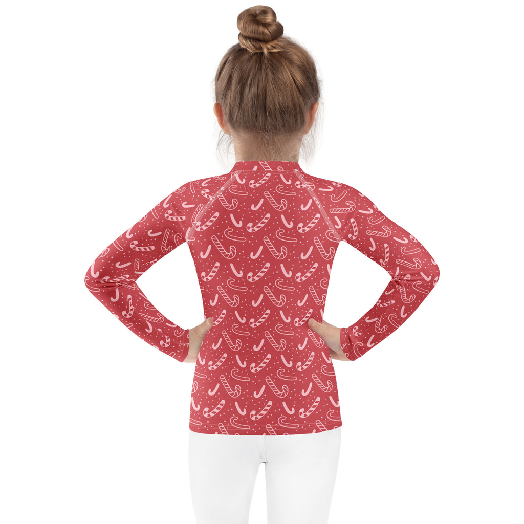 Kids red candy cane long sleeve rash guard swim shirt with upf 50 plus for christmas beachwear