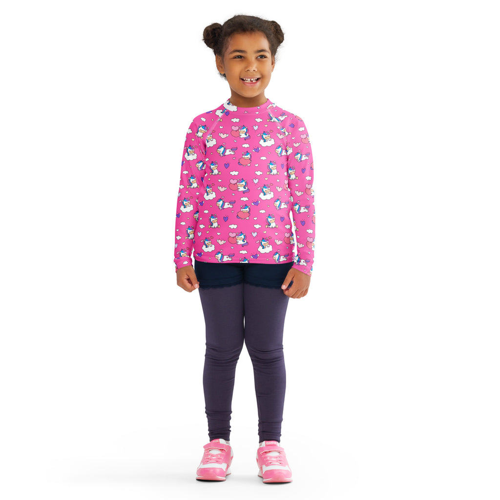 Girls pink long sleeve rash guard swim shirt with playful unicorn hearts pattern and upf 50 plus sun protection