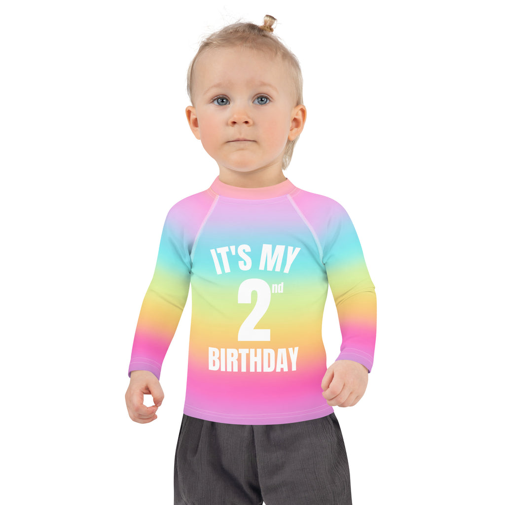 Girls bright rainbow long-sleeved rash guard with upf 50 plus and custom age birthday print in white