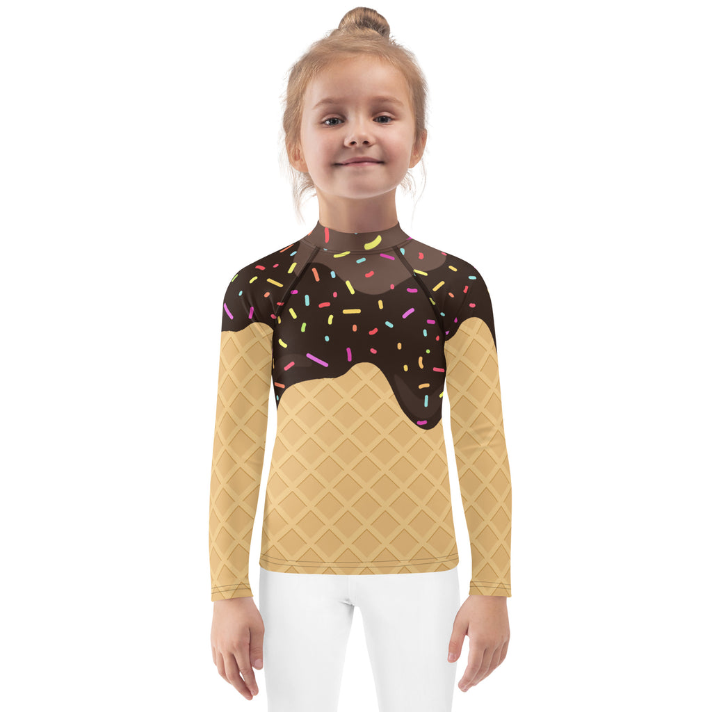 A kids long sleeve rash guard swim shirt featuring a chocolate ice cream waffle cone design with colorful sprinkles and upf 50+ protection