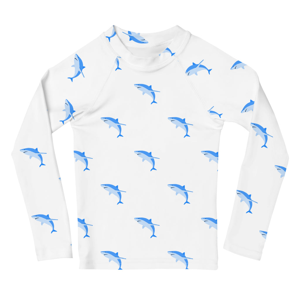 Kids shark long sleeve rash guard swim shirt in white with blue cartoon shark pattern and UPF 50 plus protection