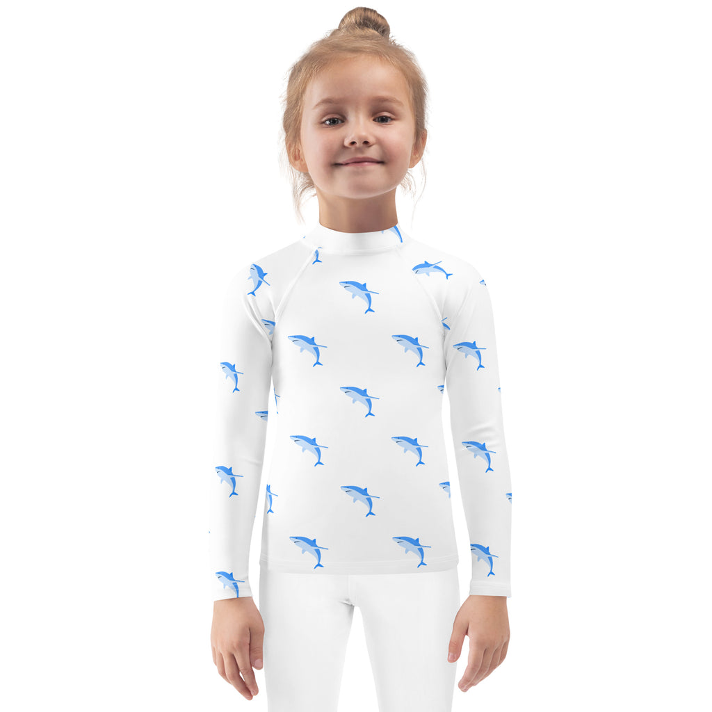 Kids white long sleeve rash guard with blue shark pattern swim shirt featuring UPF 50 plus sun protection