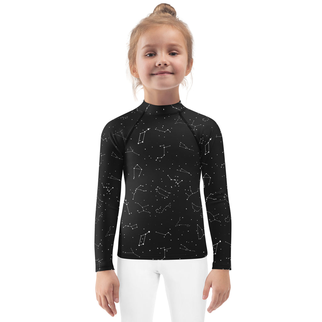 Black long sleeved rash guard for kids with white constellation pattern and upf 50 plus sun protection
