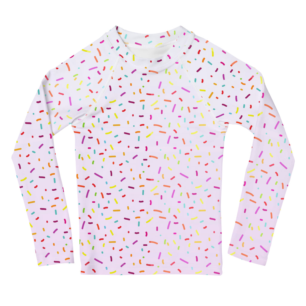 Kids colorful sprinkles long sleeve rash guard swim shirt in white with multicolored sprinkle pattern and upf 50+ protection